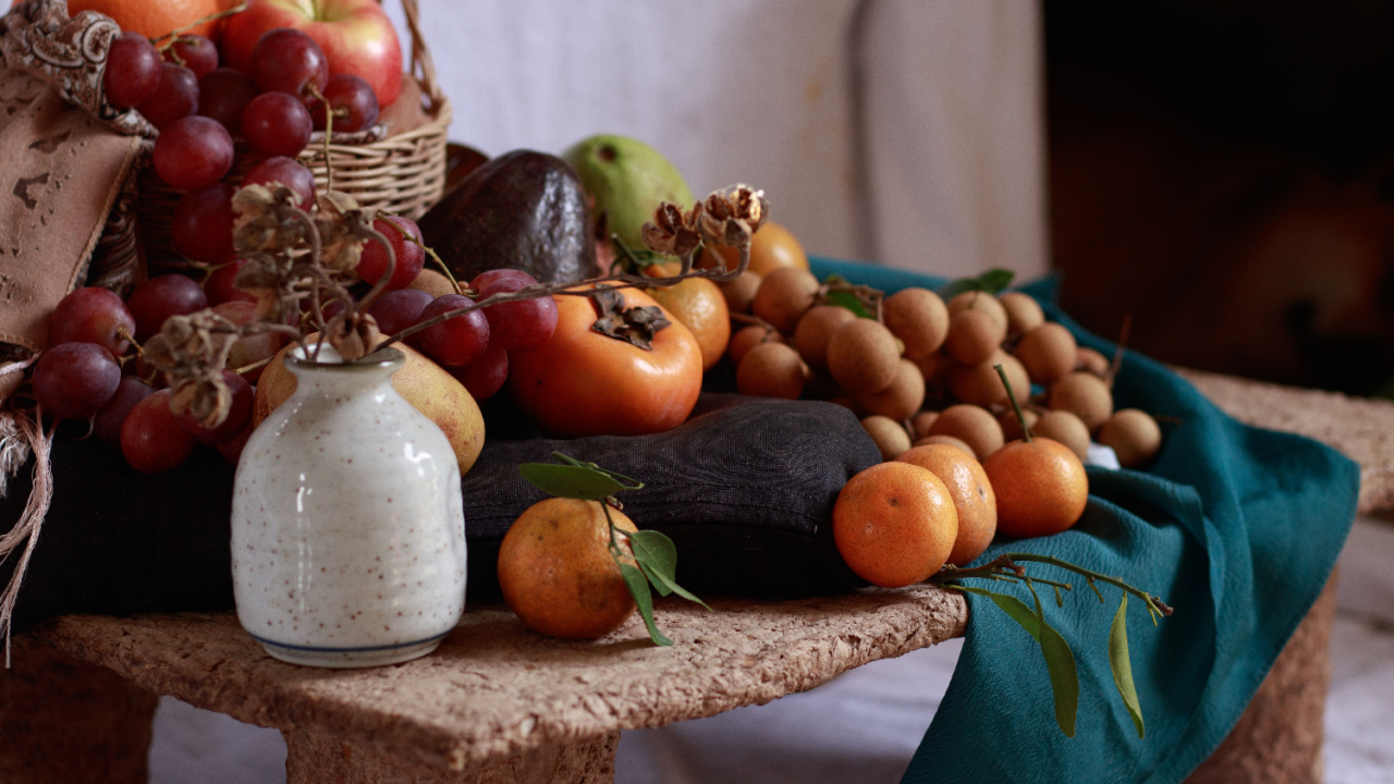 A table filled with twelve different round sweet fruits, a Filipino belief and ritual to bring luck in the New Year