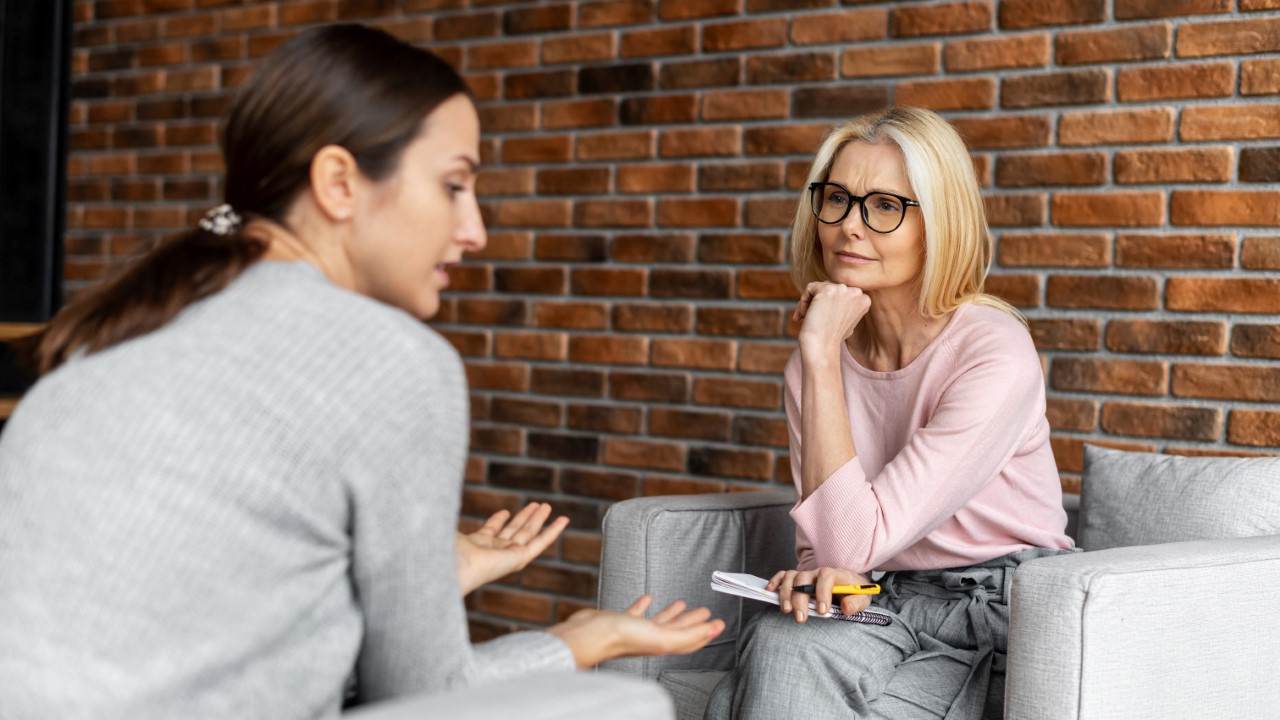 Attentive listener, depressed woman patient with a female therapist