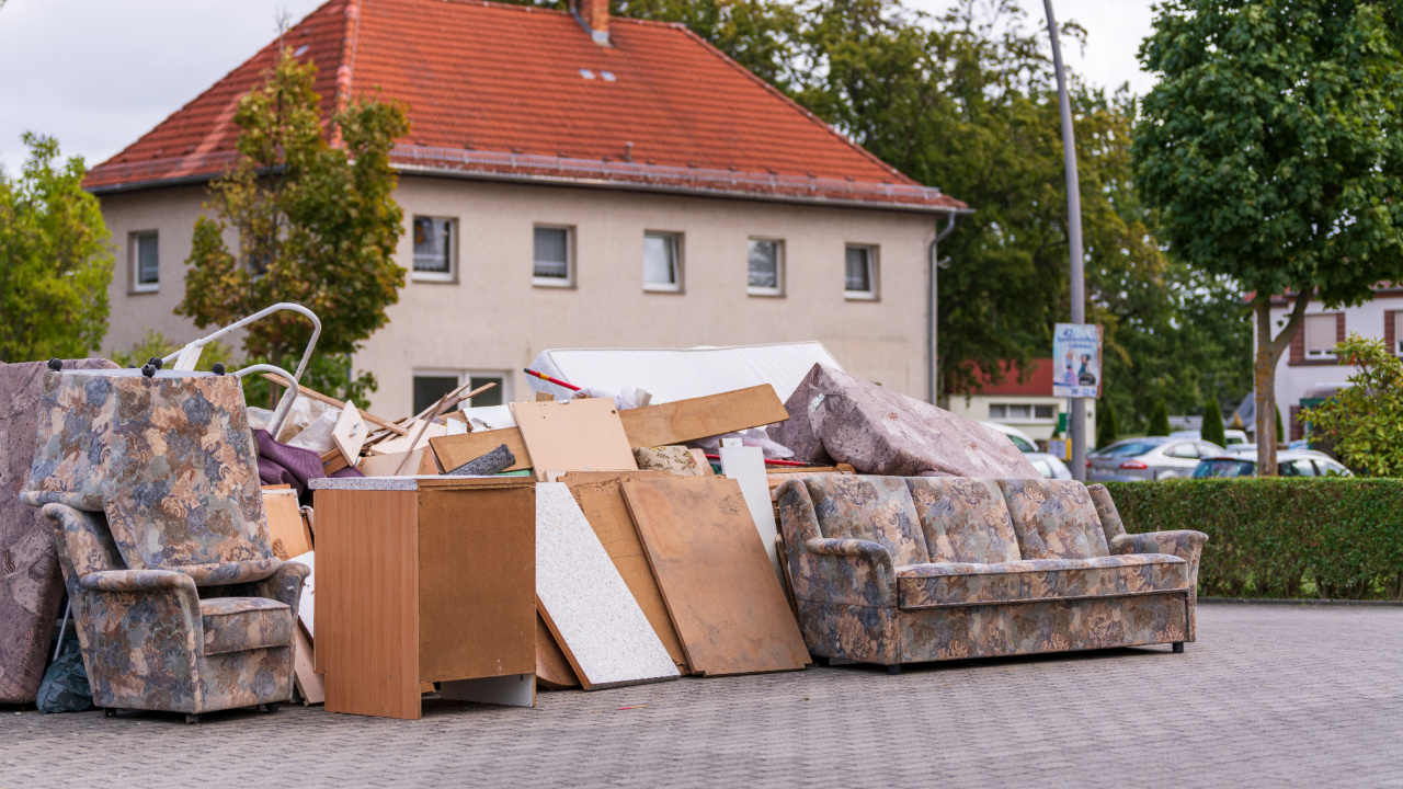 Old furniture throwing, bulky waste in front of a house