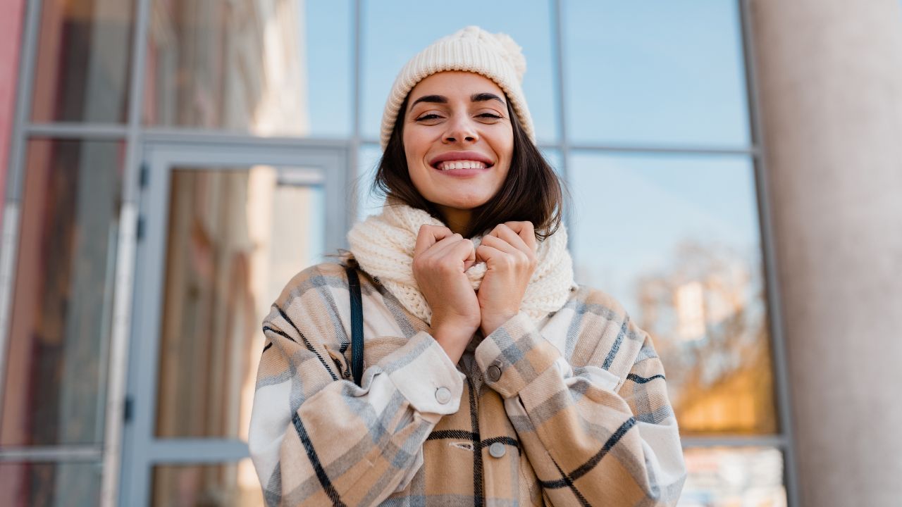 woman getting fresh air outside in winter.